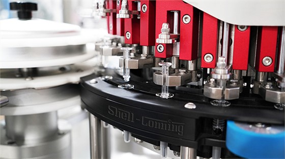 脱巢拧杆贴标系统